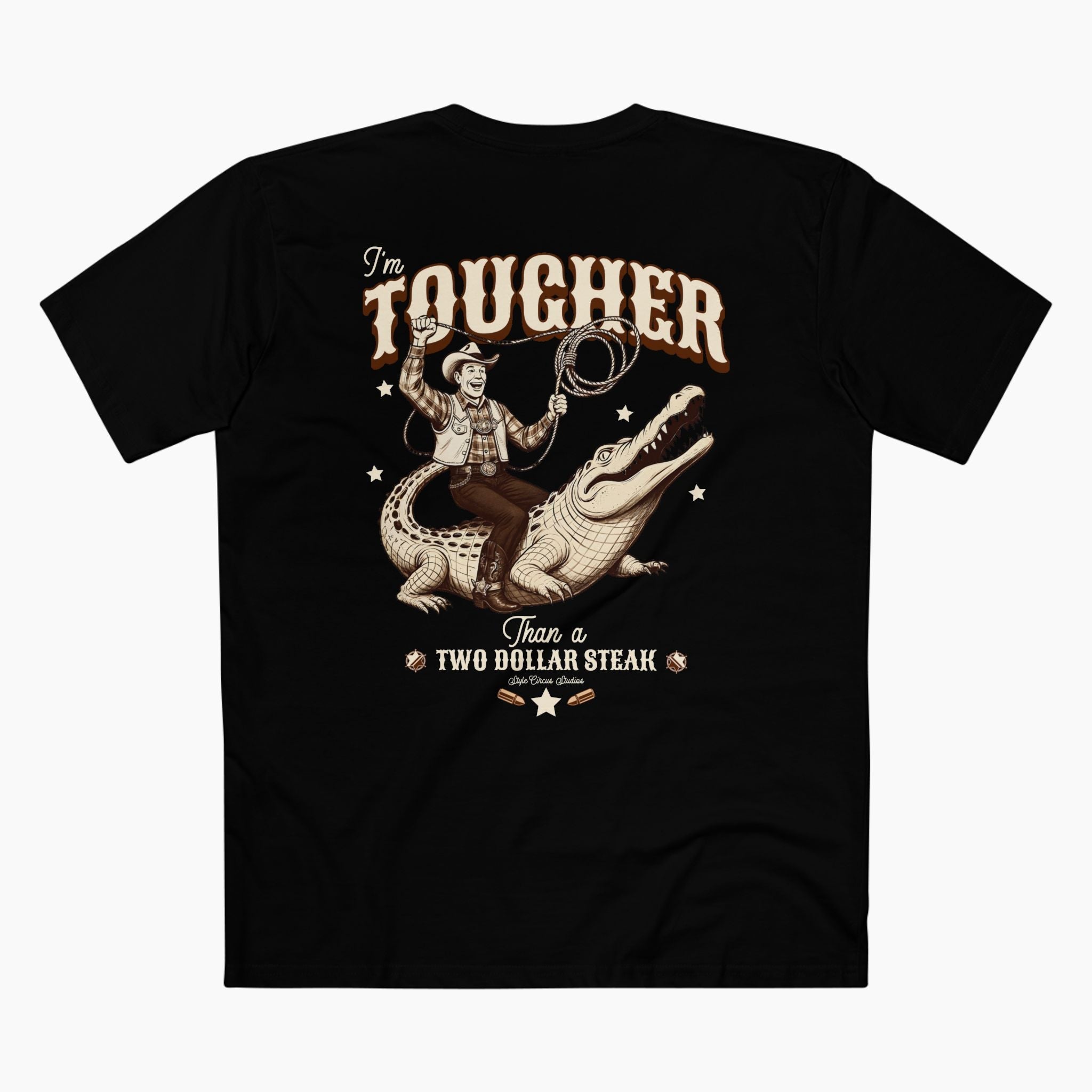 Black t-shirt with a graphic of a cowboy and alligator, and text 'I'm Tougher Than a Two Dollar Steak' on a white background.