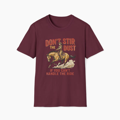Maroon t-shirt with a graphic of a rider on a horse and text 'Don't stir the dust if you can't handle the ride' on a white background.