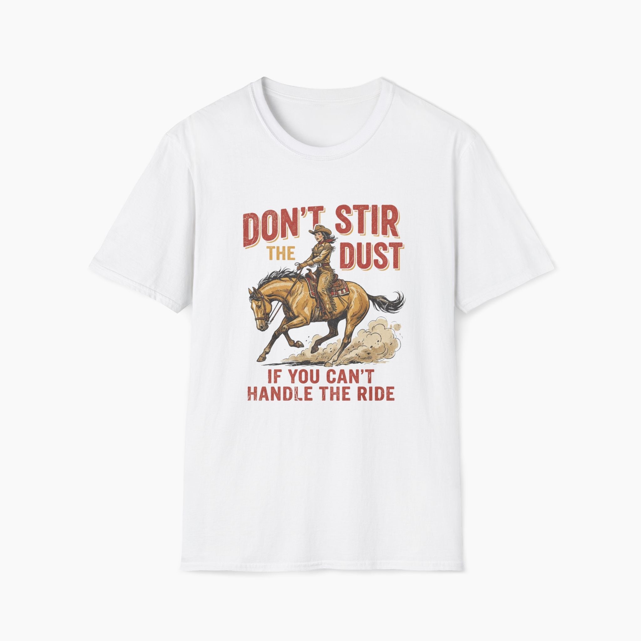 White t-shirt with a graphic of a cowboy on a horse and text 'Don't stir the dust if you can't handle the ride' on a white background.