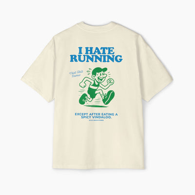 Beige t-shirt with humorous graphic and text on a white background